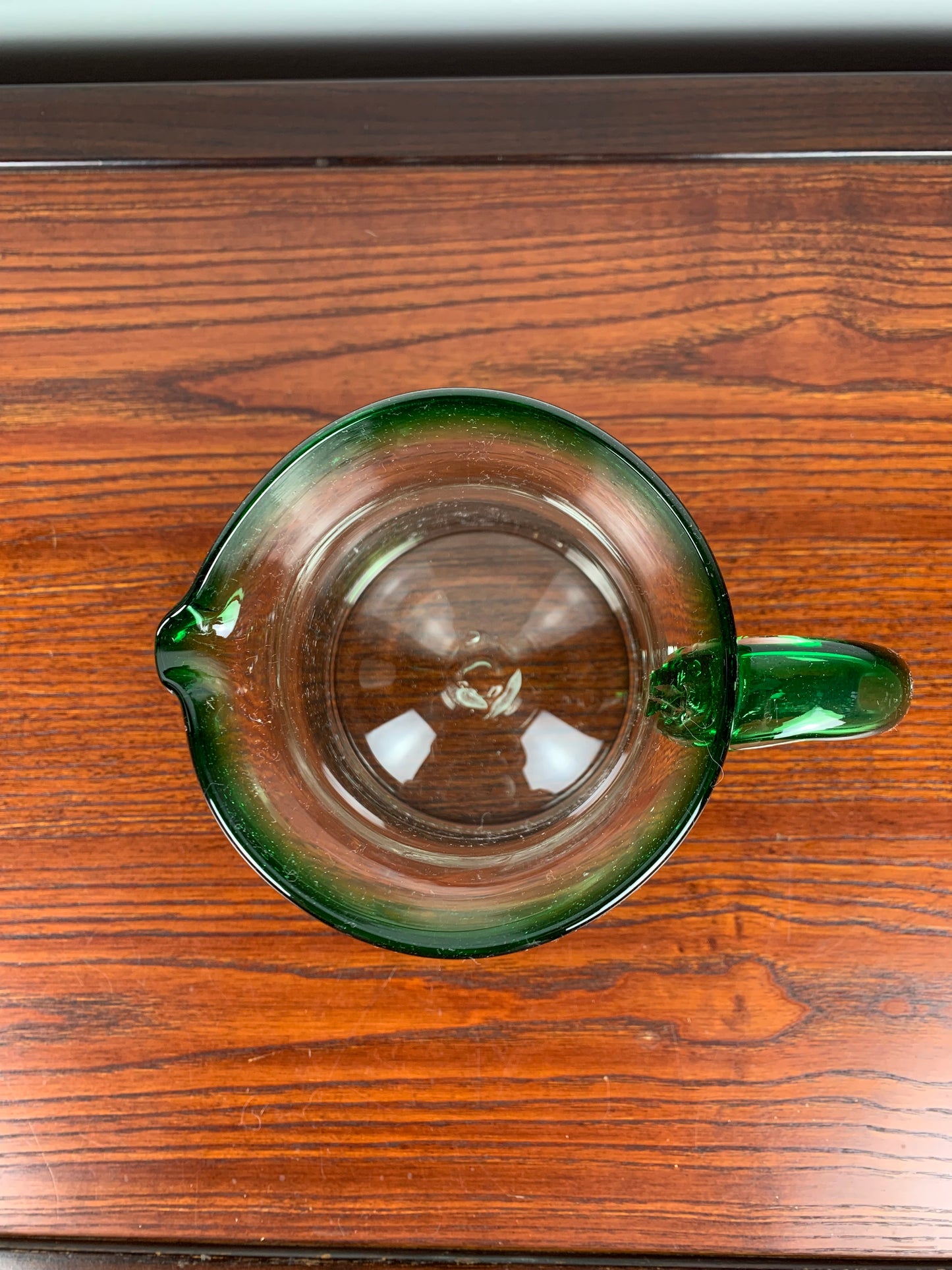 Vintage blown glass jug, green border