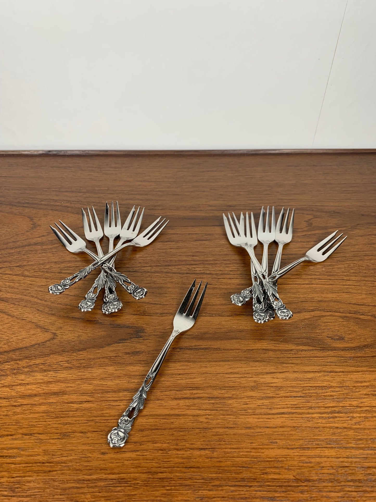 Set of 10+1 Japanese stainless steel dessert forks, rose pattern, 1970