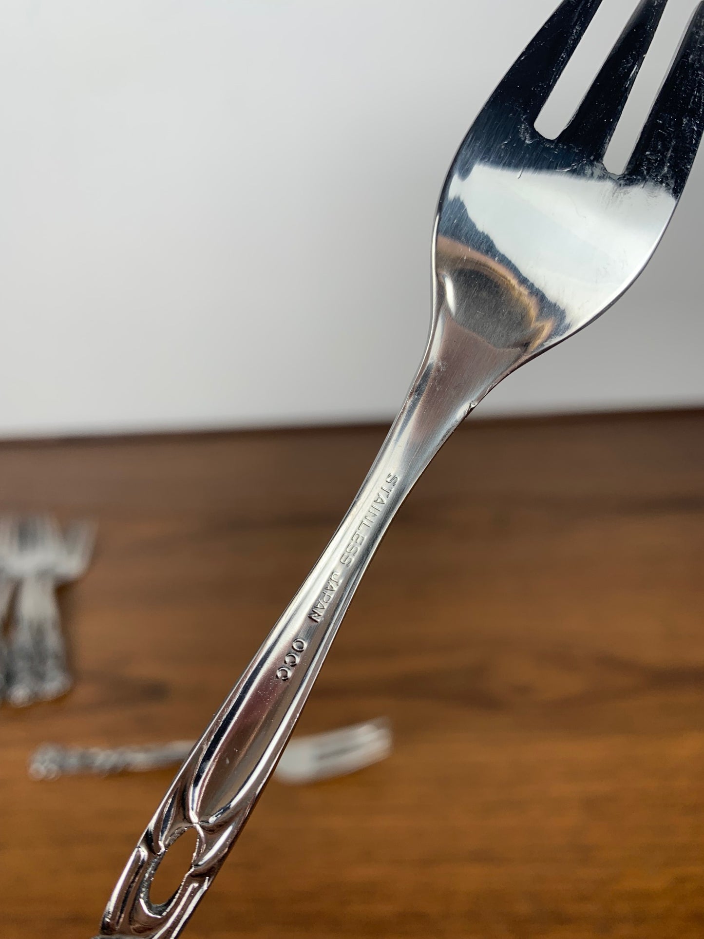 Set of 10+1 Japanese stainless steel dessert forks, rose pattern, 1970