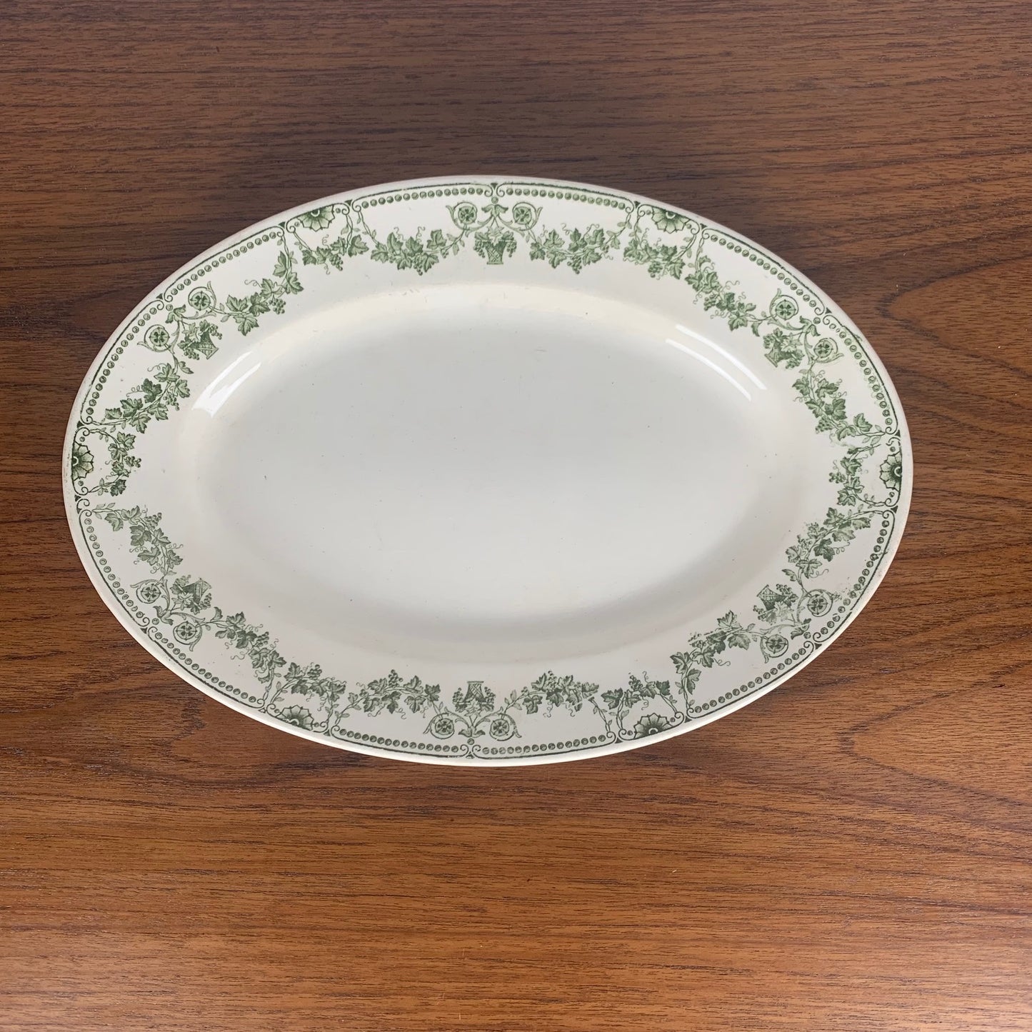 Oval dish, "Champagne" model, Badonviller, green