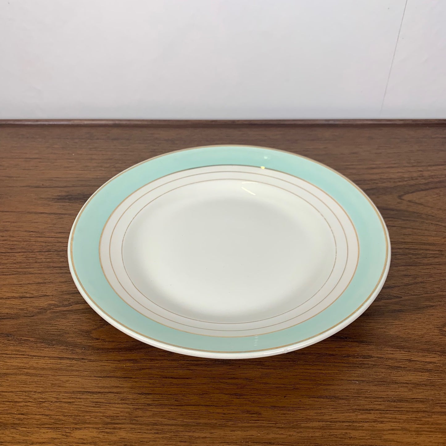Plat rond Lunéville modèle "Régence" vert d'eau , fin XIXe