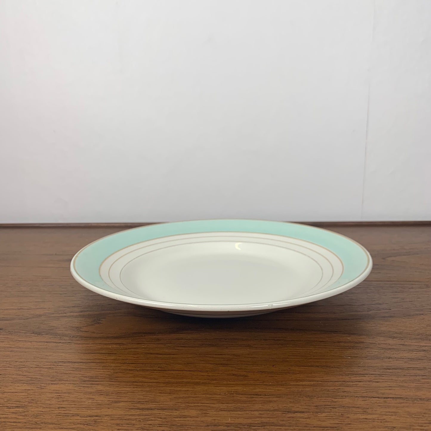 Plat rond Lunéville modèle "Régence" vert d'eau , fin XIXe