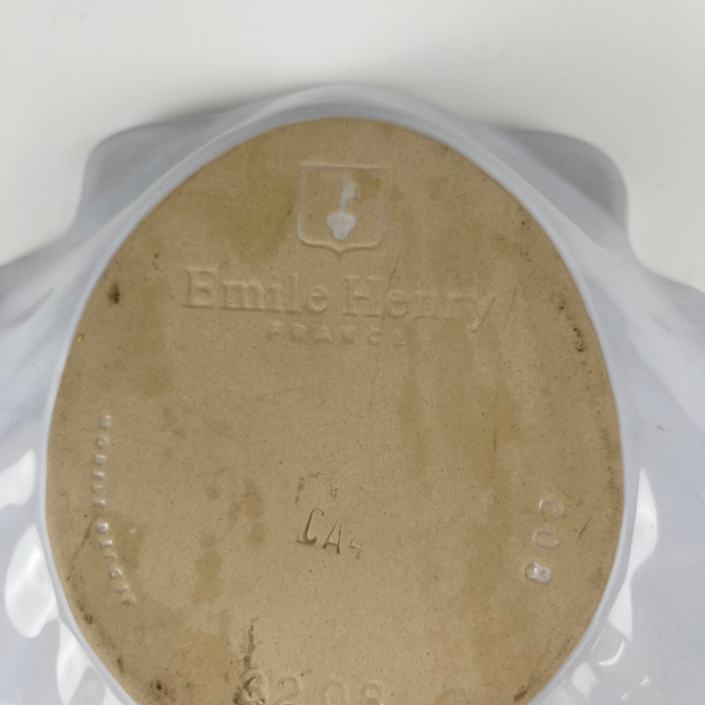 Large platter in the shape of a scallop shell, Emile Henry, France, mid-20th century