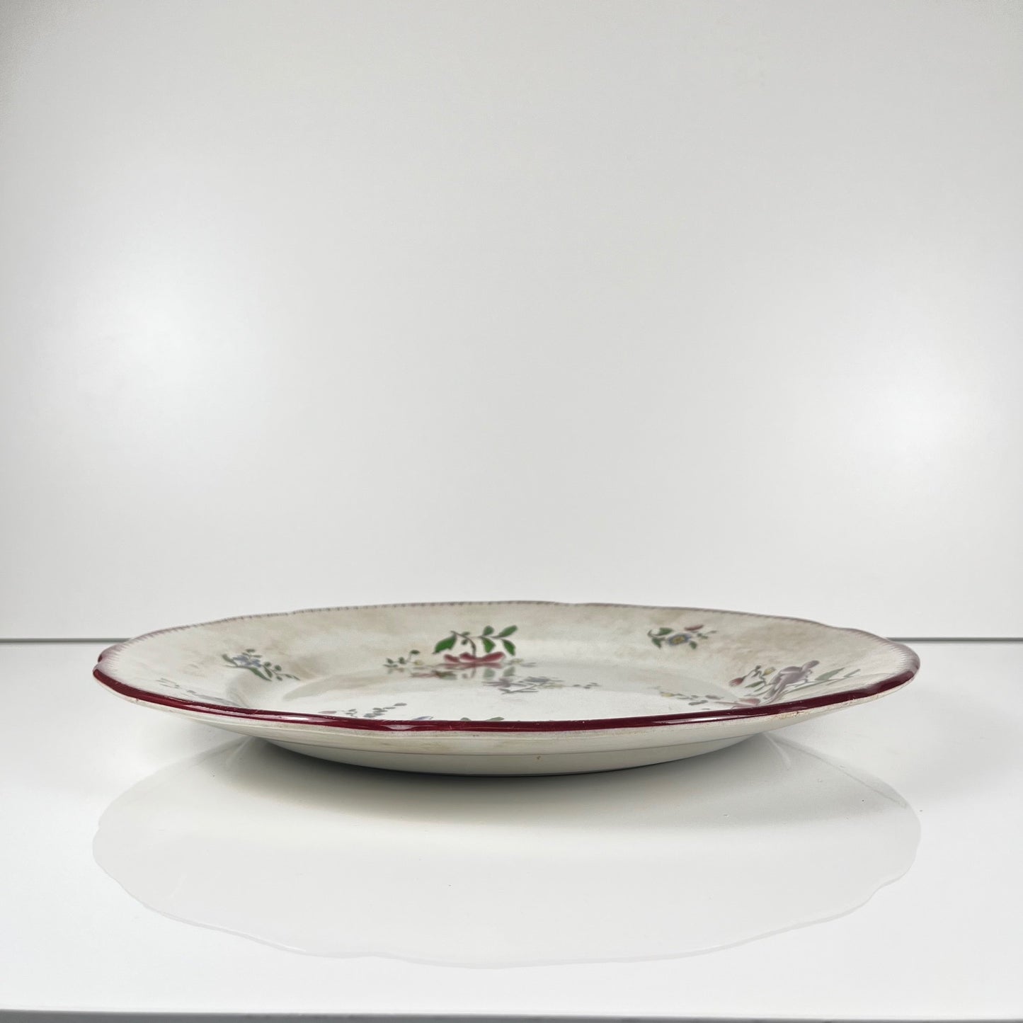 Large round patinated dish, Strasbourg model, Sarreguemines, 1880-1918