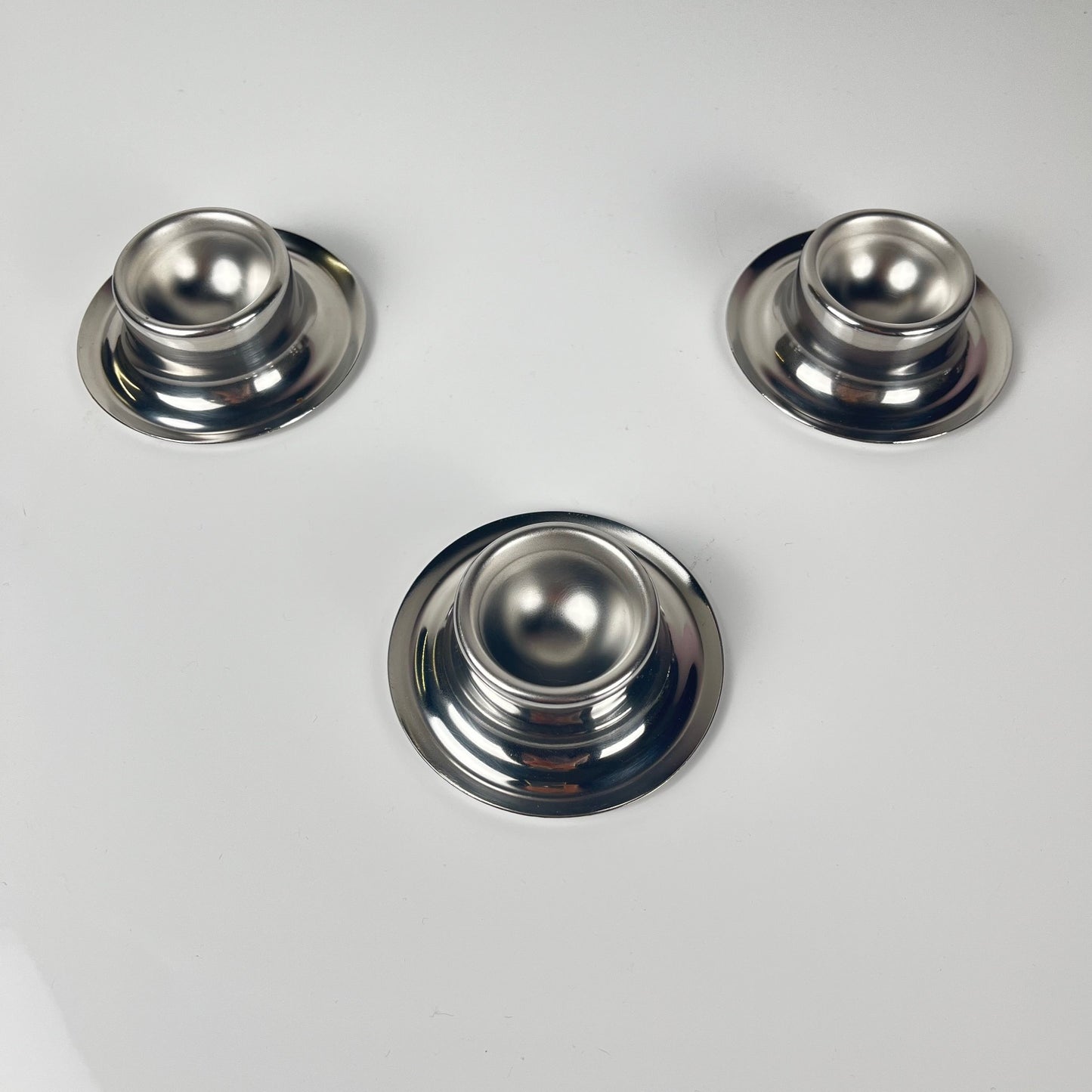 Set of 3 stainless steel egg cups, 1970