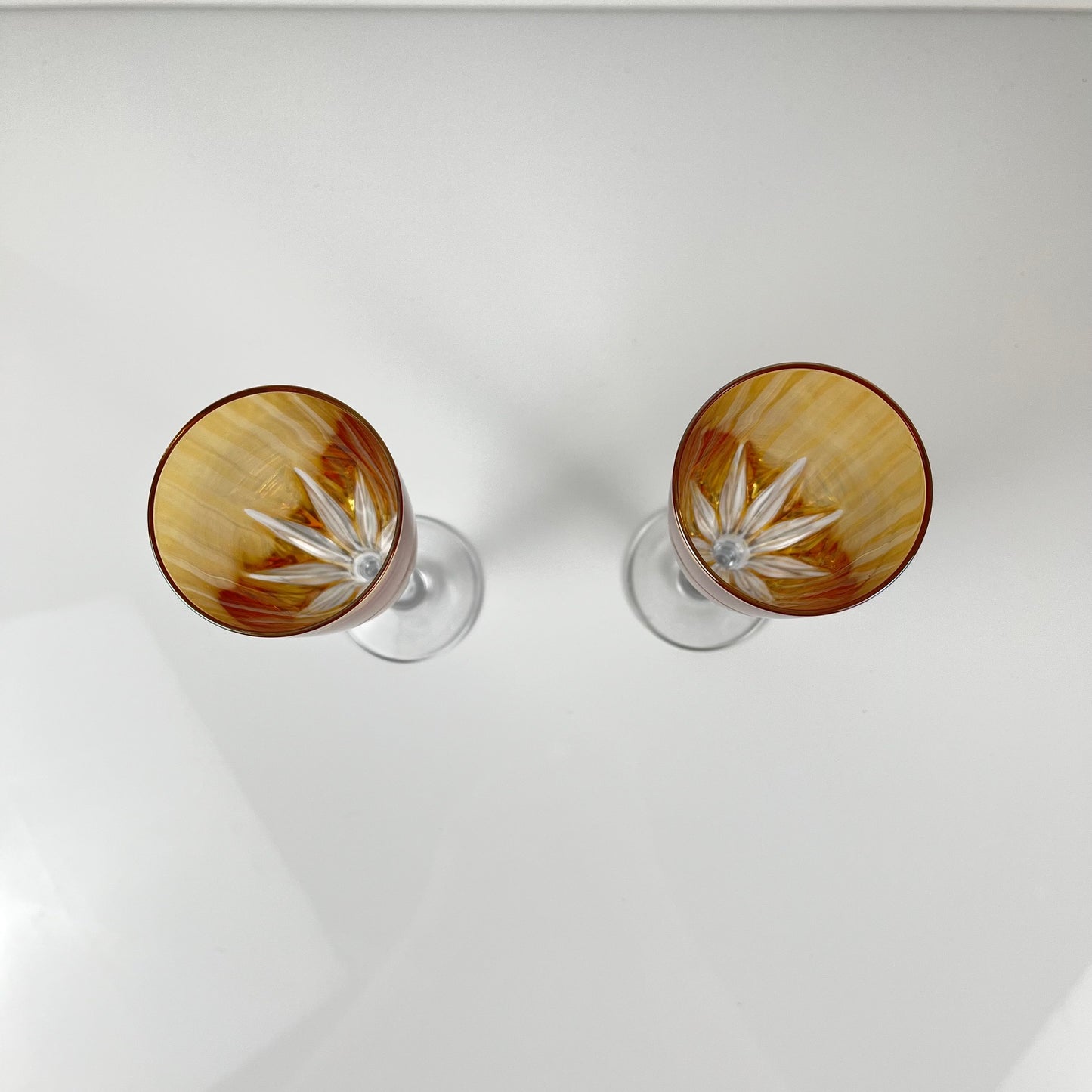 Yellow colored crystal champagne coupe duo