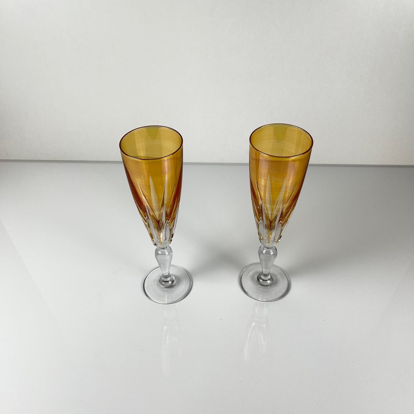 Yellow colored crystal champagne coupe duo