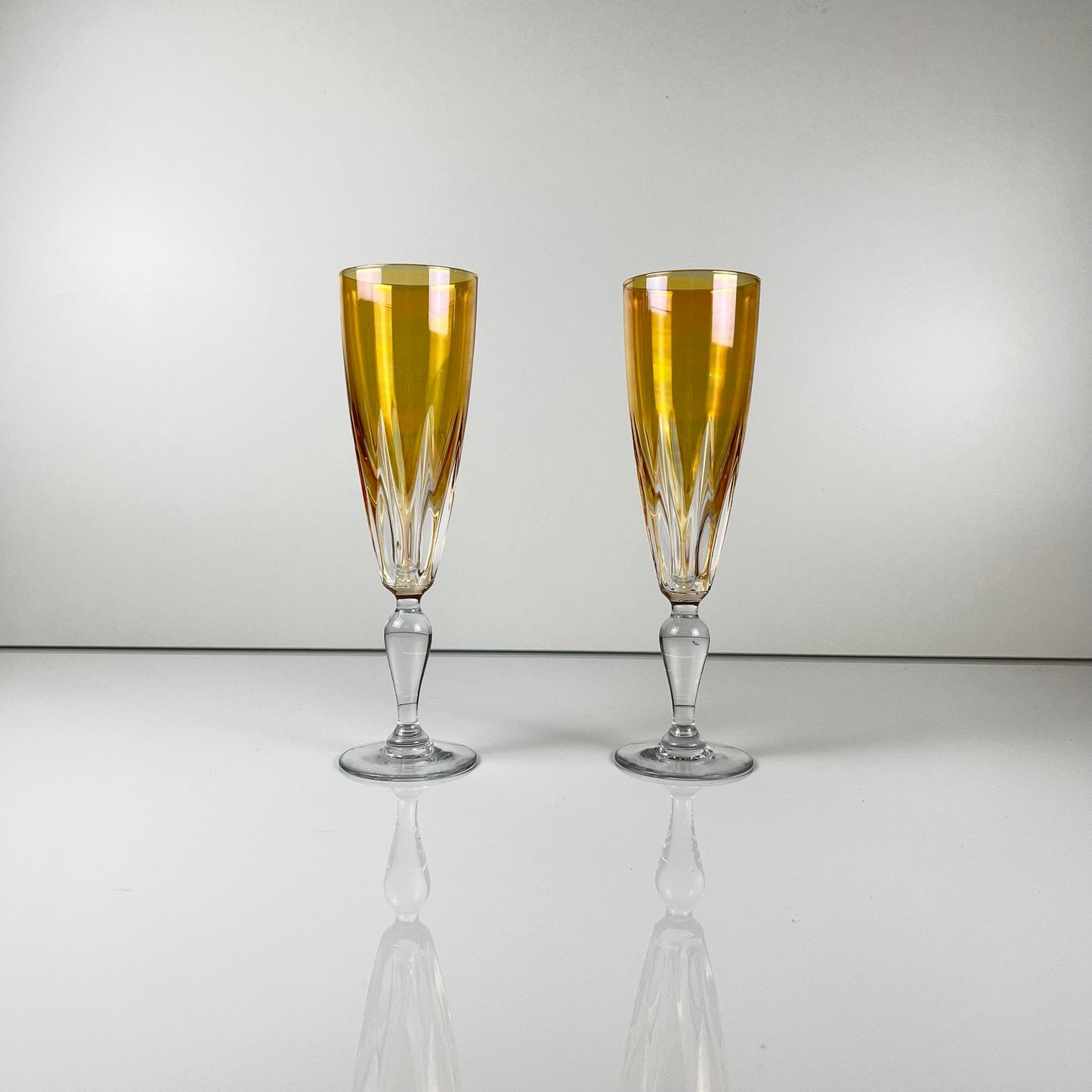 Yellow colored crystal champagne coupe duo