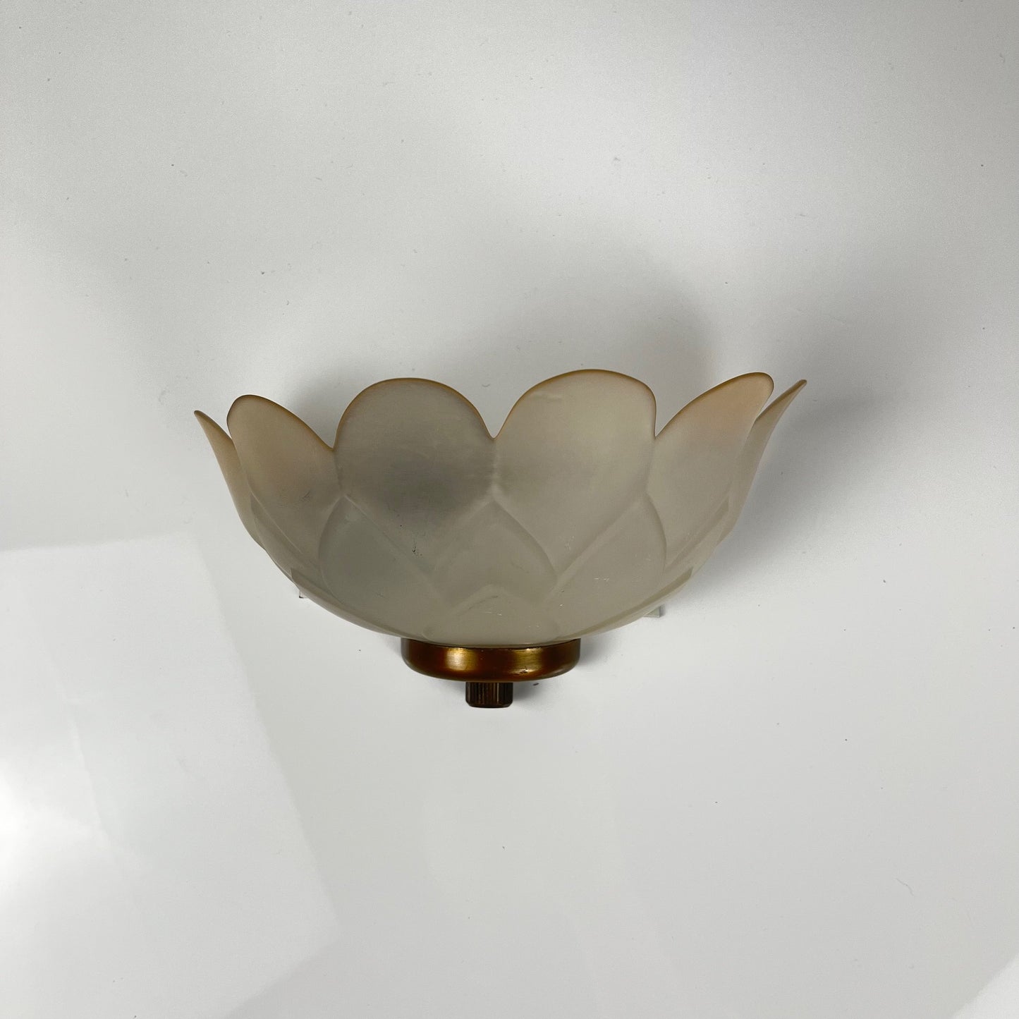 Trio of vintage frosted glass and brass wall sconces
