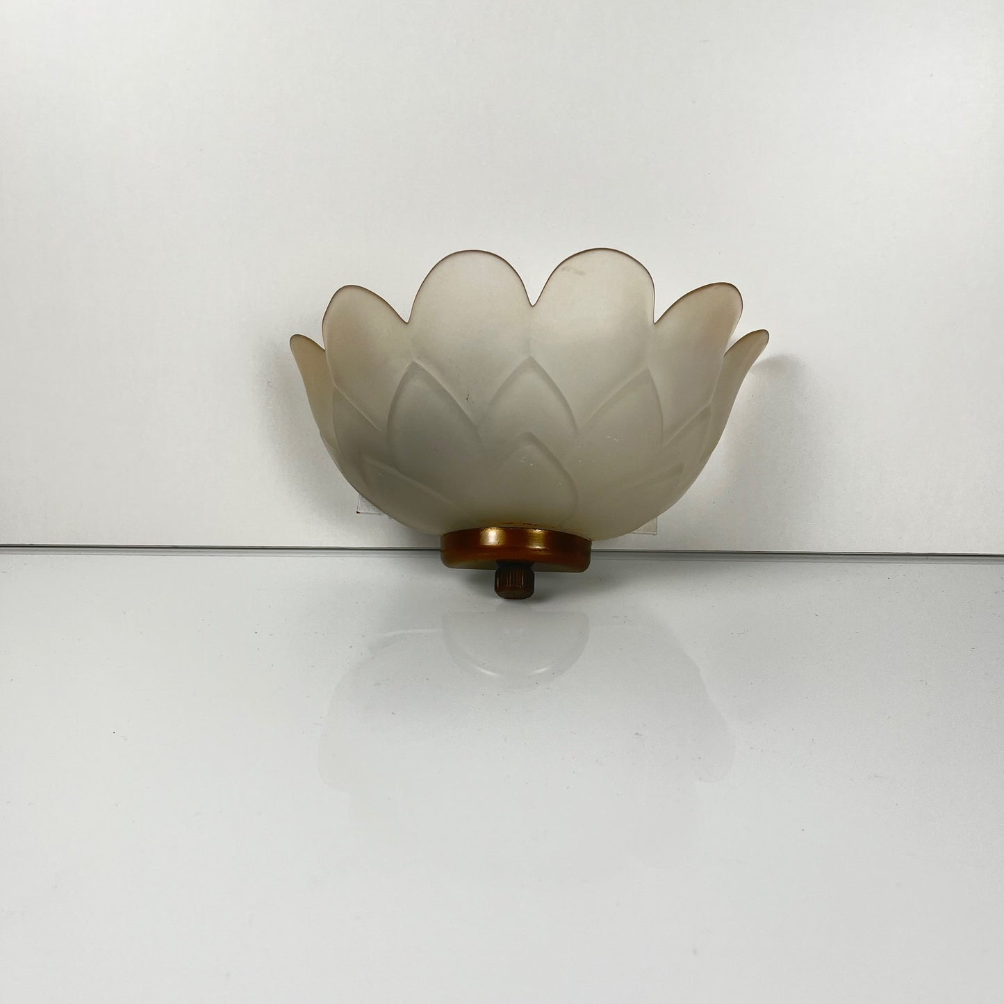 Trio of vintage frosted glass and brass wall sconces
