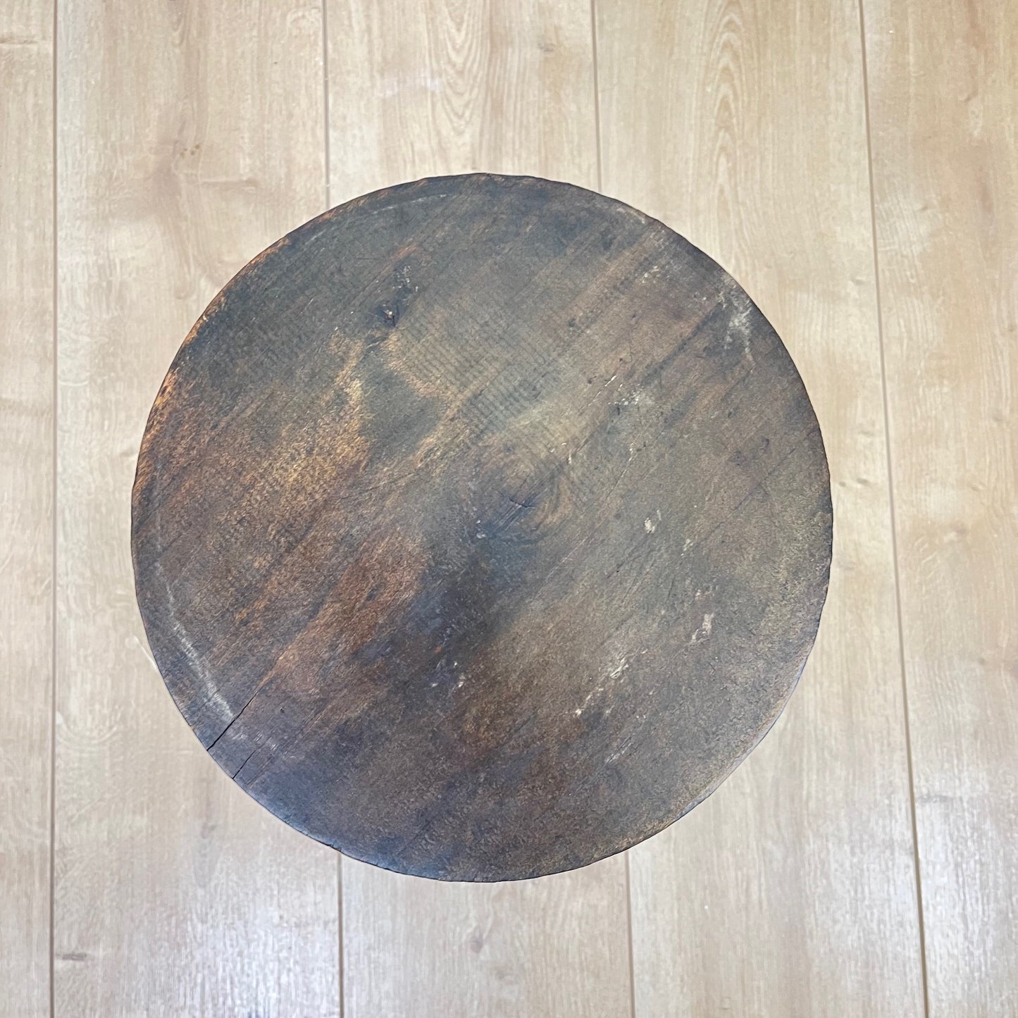 Small brutalist tripod stool in solid wood