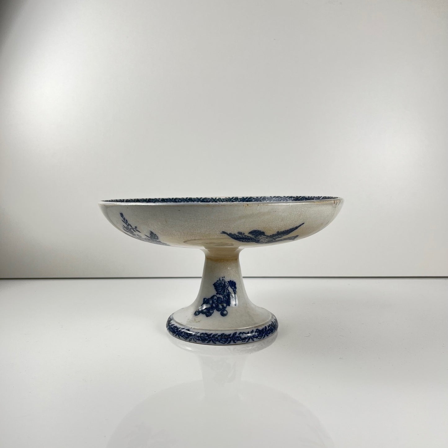 Compotier terre de Fer Pexonne, motif oiseau bleu fin XIXe