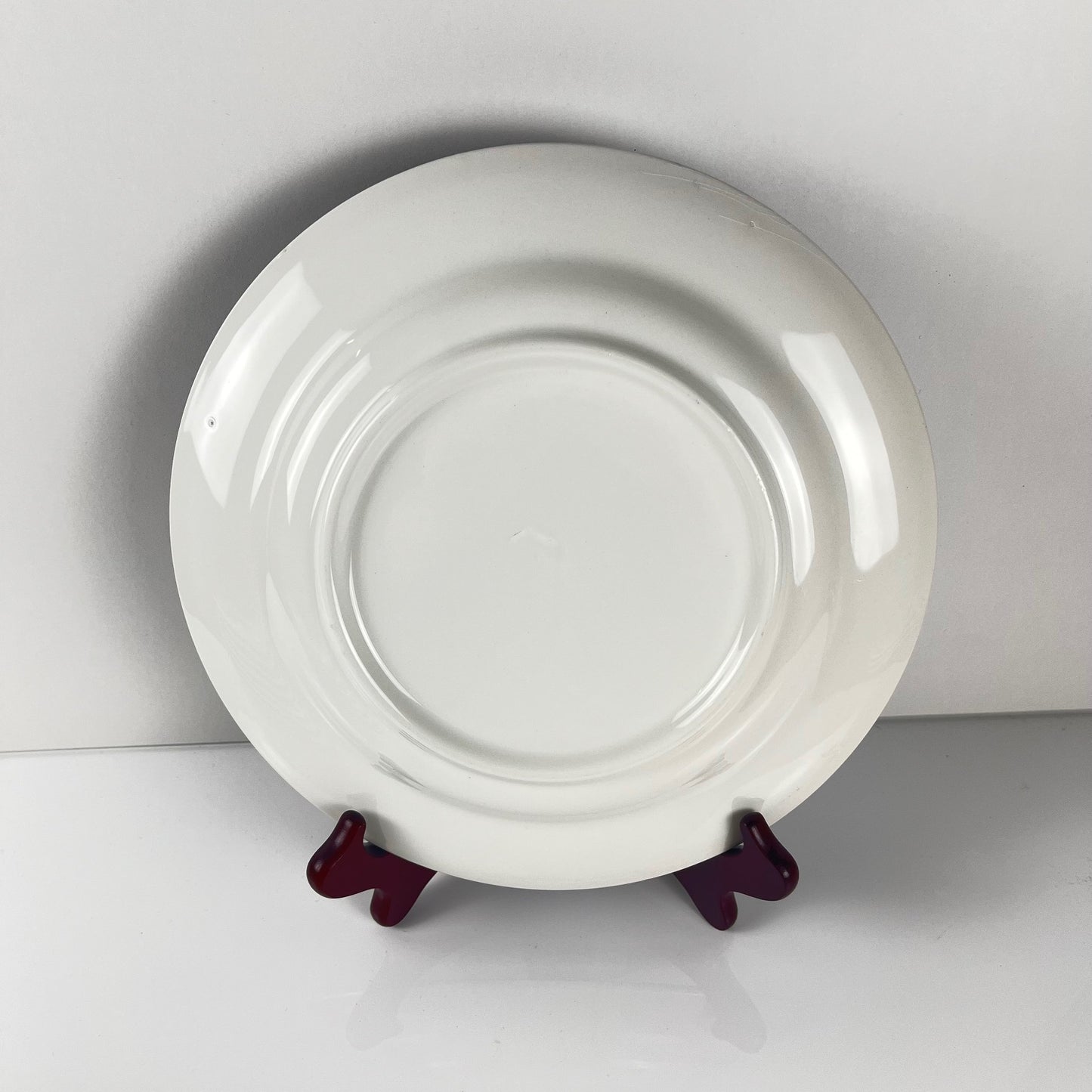 Set of 8 blue earthenware dinner plates with floral and bird decoration, early 20th century
