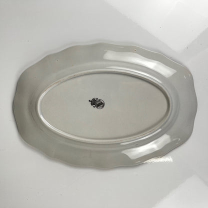 Small oval dish with flat ends, "Réverbère" model by KG Lunéville, tulip pattern.