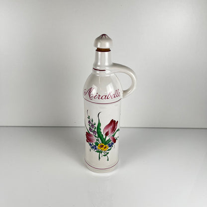 "Mirabelle" bottle, "Réverbère" model by KG Lunéville, tulip and rose pattern.