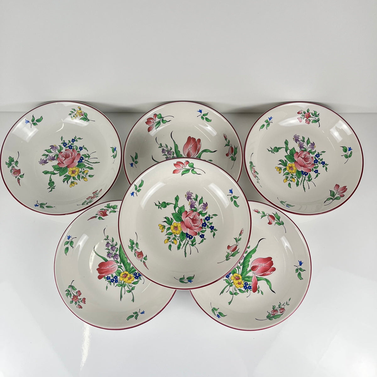 Set of 6 deep plates, "Réverbère" model by KG Lunéville, tulip and rose pattern.