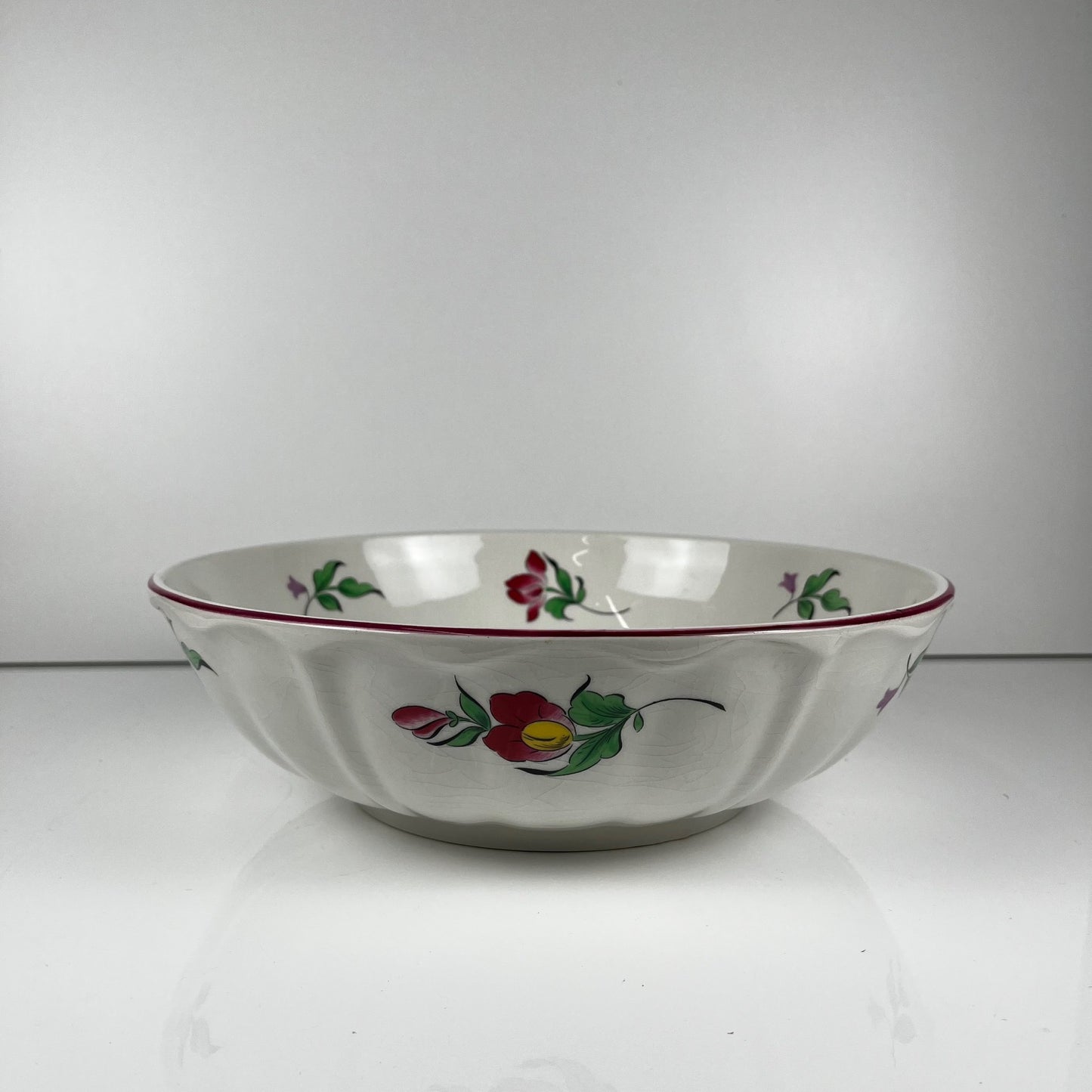 Large round salad bowl, Réverbère pattern by KG Lunéville, rose design