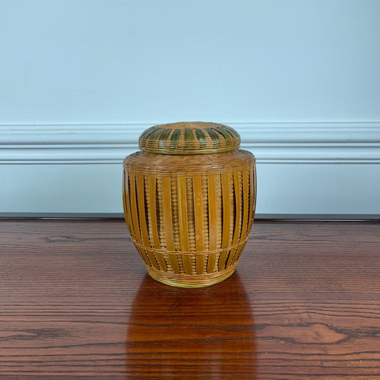 Antique Asian ceramic and hand-woven wicker ginger jar