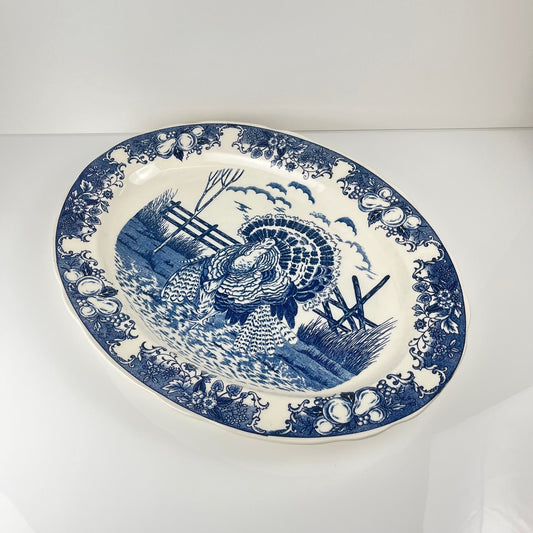 Grand plat ovale vintage en faïence bleue décor dinde
