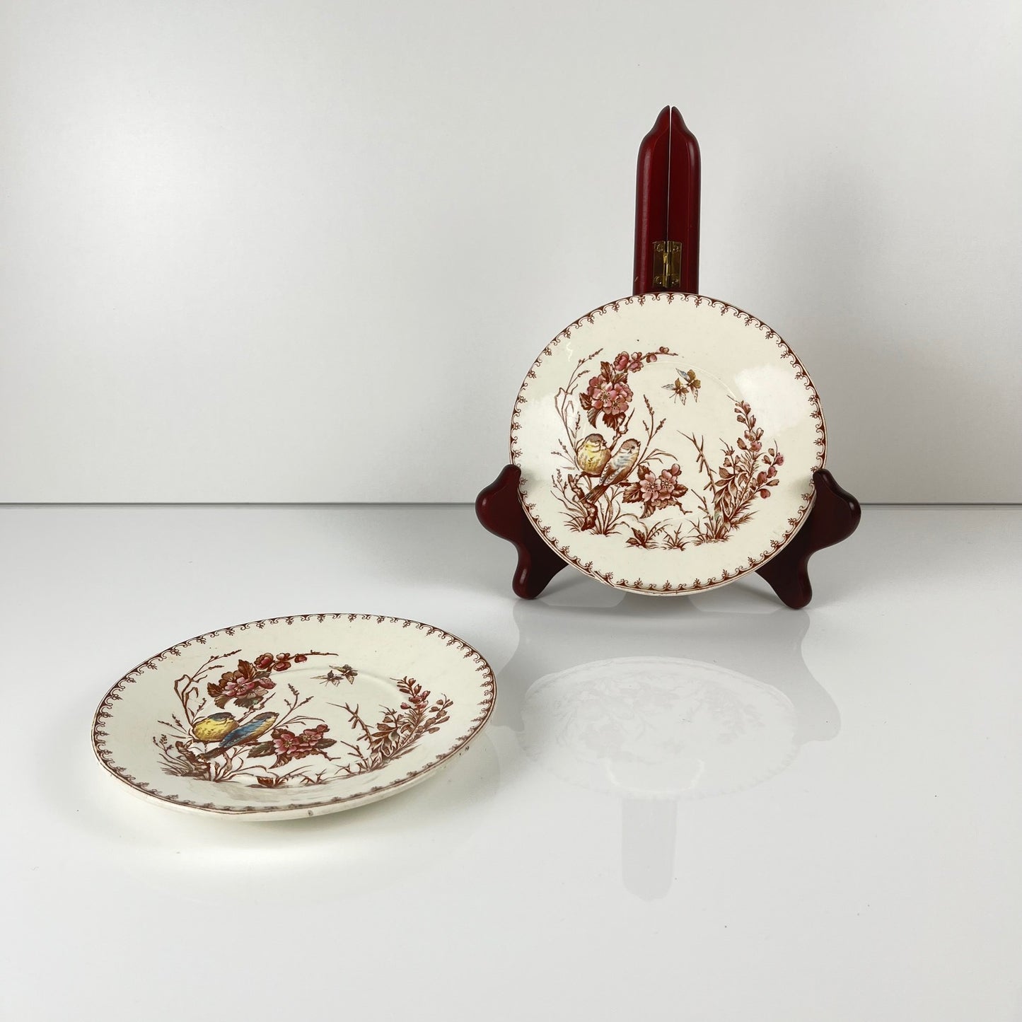 Rare pair of two KG Lunéville "tit" bread plates, 1875-1890