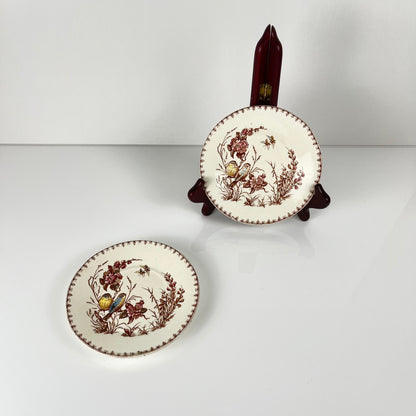 Rare pair of two KG Lunéville "tit" bread plates, 1875-1890