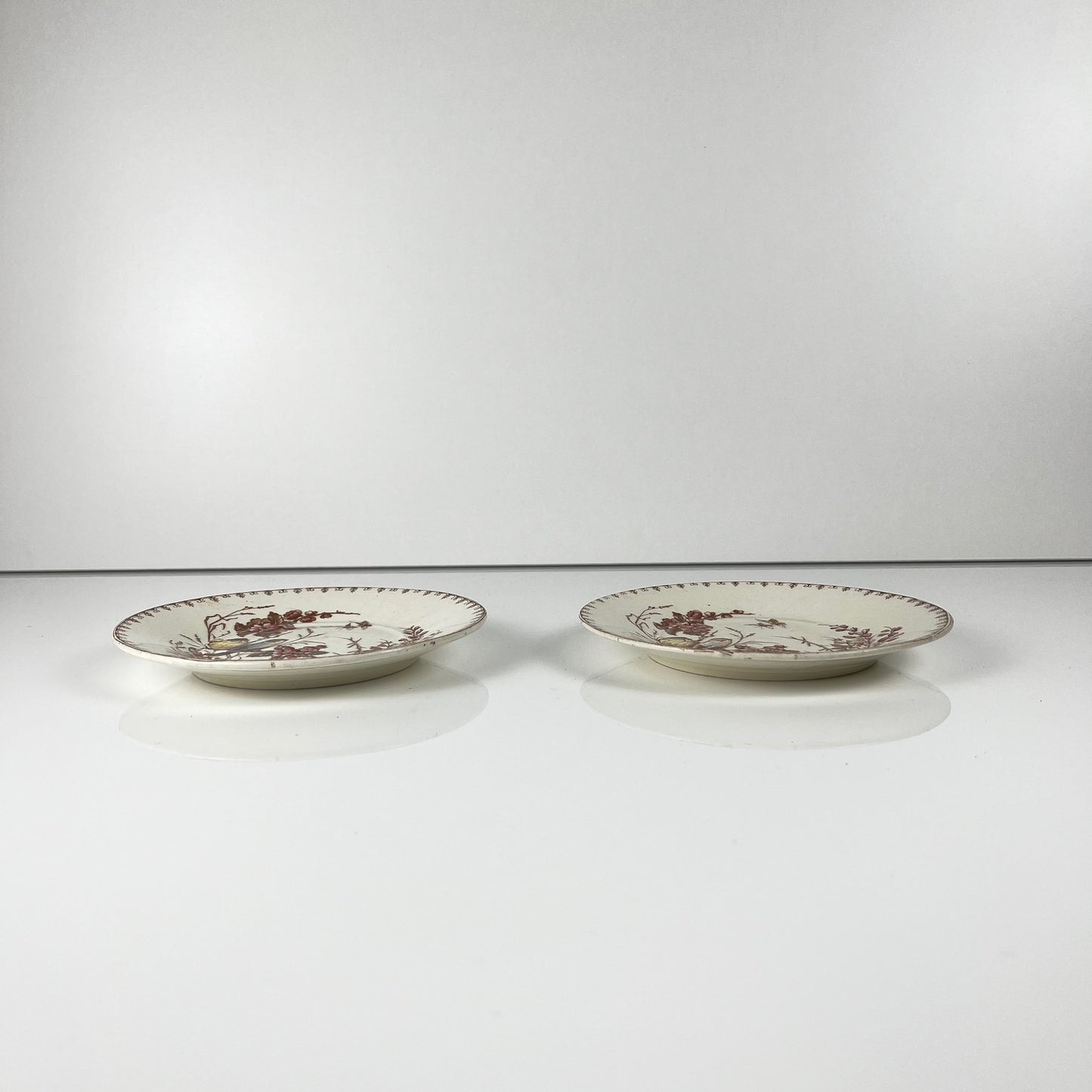 Rare pair of two KG Lunéville "tit" bread plates, 1875-1890