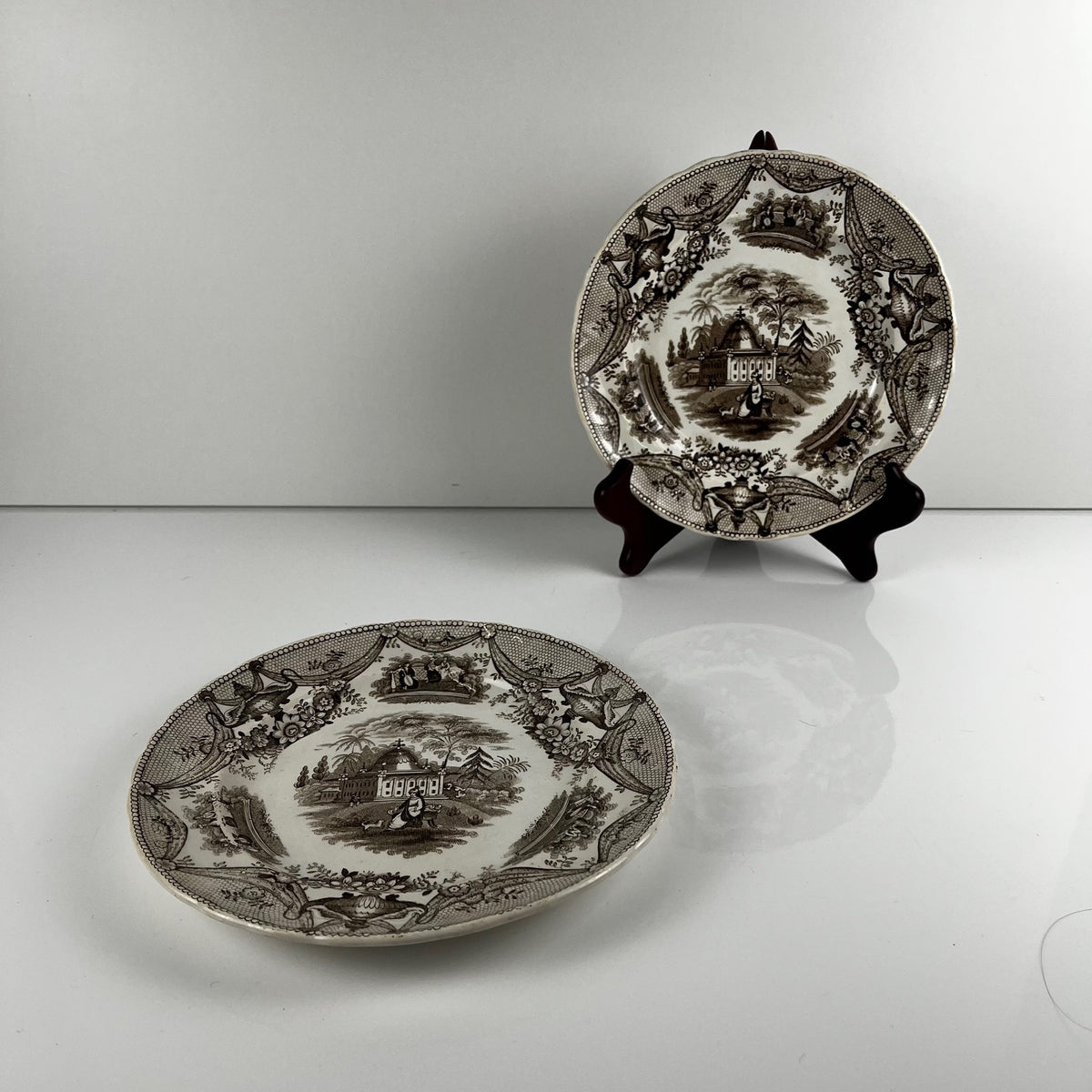 Pair of antique fine earthenware dessert plates by David Johnston (Bordeaux), 19th century.