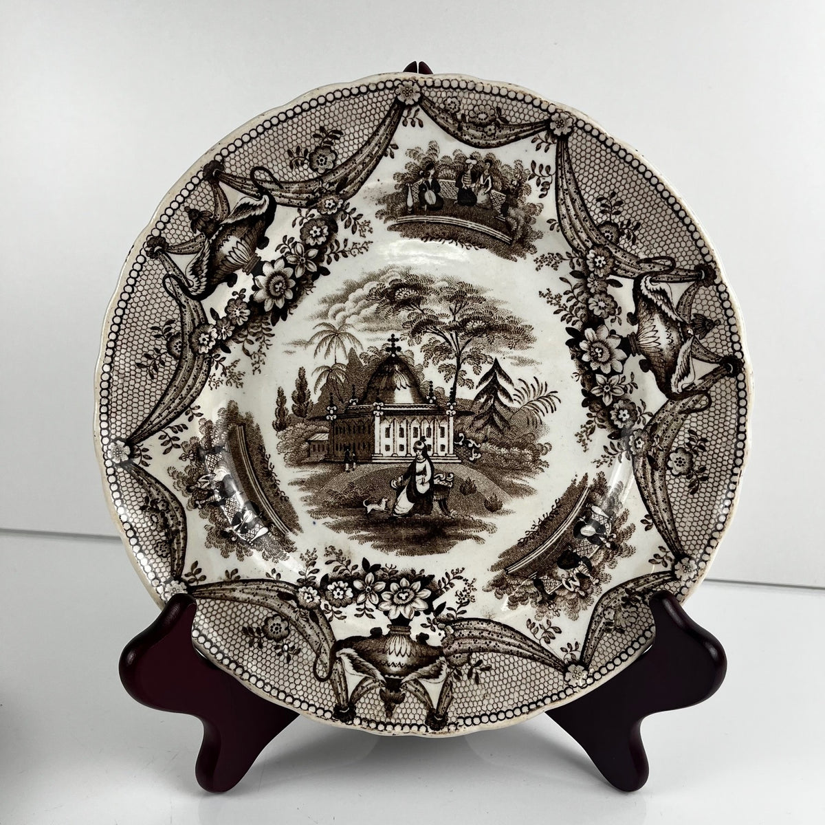 Pair of antique fine earthenware dessert plates by David Johnston (Bordeaux), 19th century.