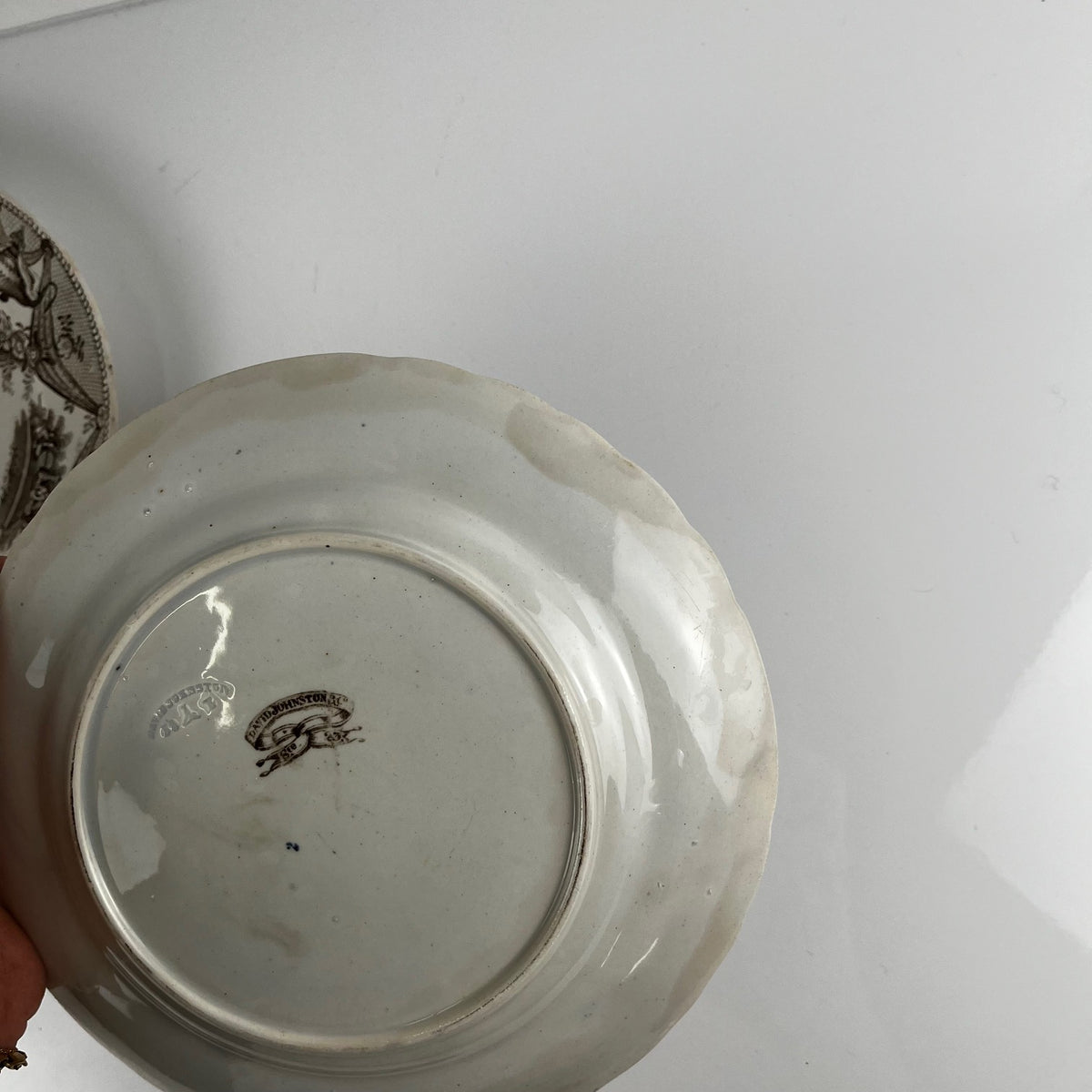 Pair of antique fine earthenware dessert plates by David Johnston (Bordeaux), 19th century.