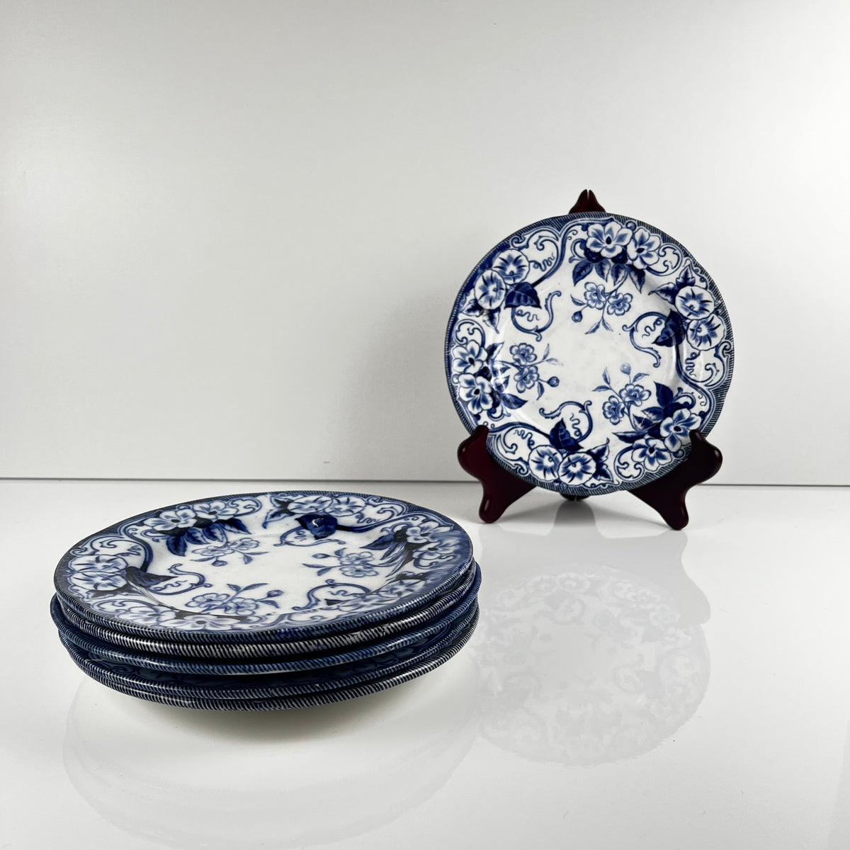 Set of 6 "Flora" *Terre de Fer* dessert plates – Creil et Montereau, 19th century, blue