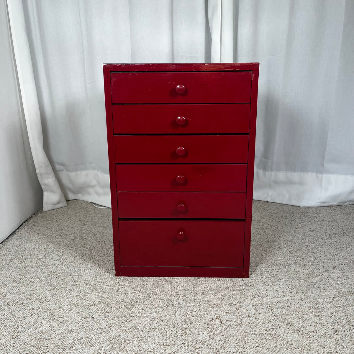 Small red-lacquered pine workshop cabinet, 1980