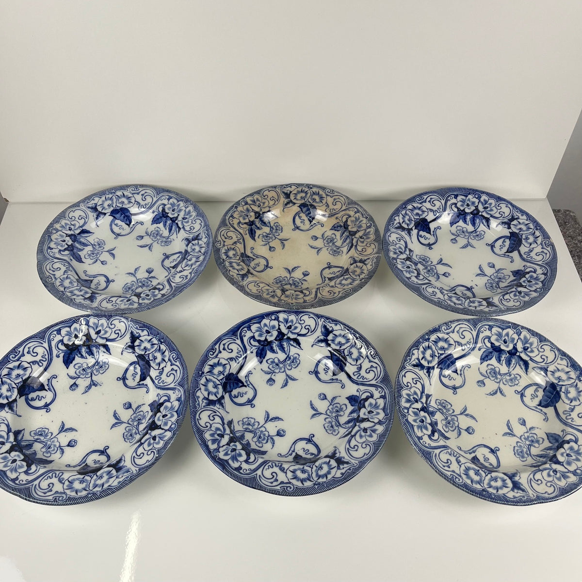 Set de 6 Assiettes creuses en Terre de Fer « Flora » – Creil et Montereau, XIXe siècle, bleu