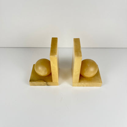 Pair of alabaster bookends, cream / yellow color 1970