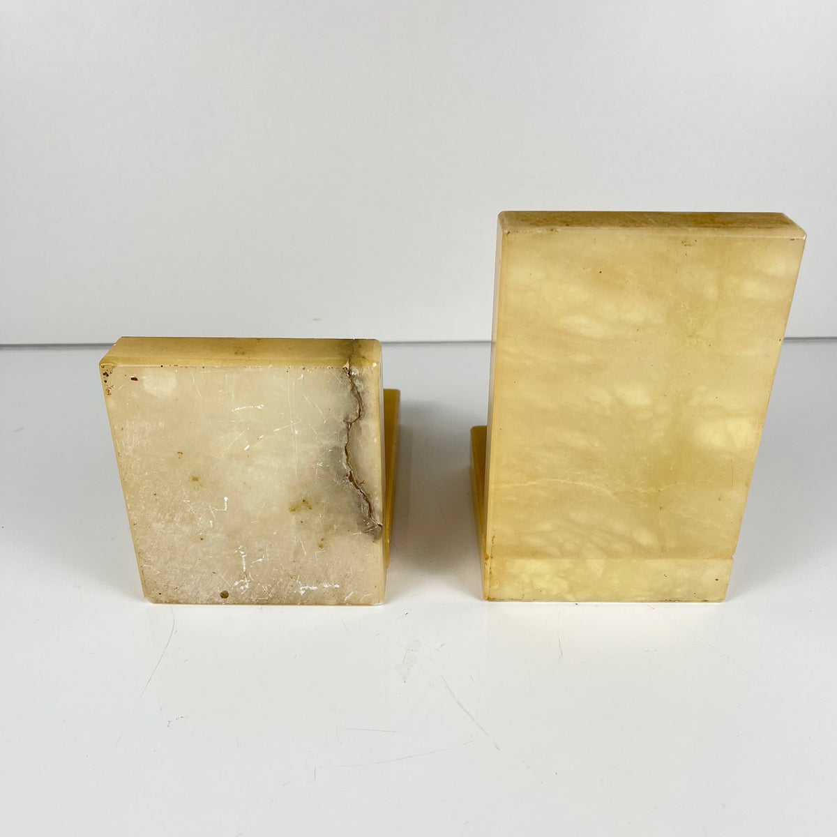 Pair of alabaster bookends, cream / yellow color 1970