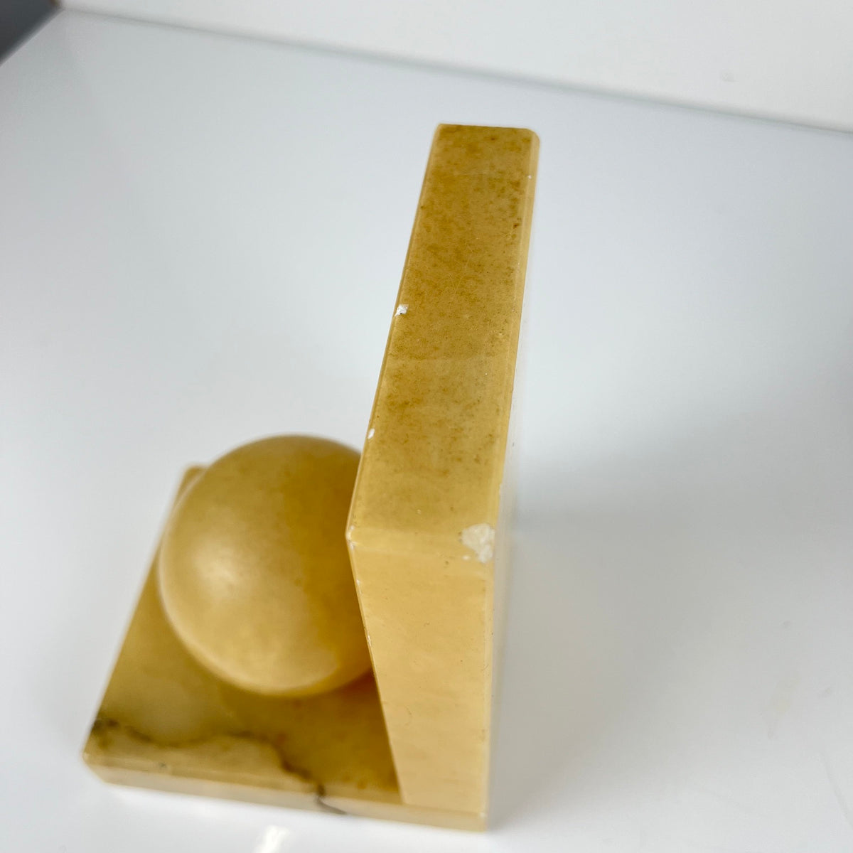 Pair of alabaster bookends, cream / yellow color 1970