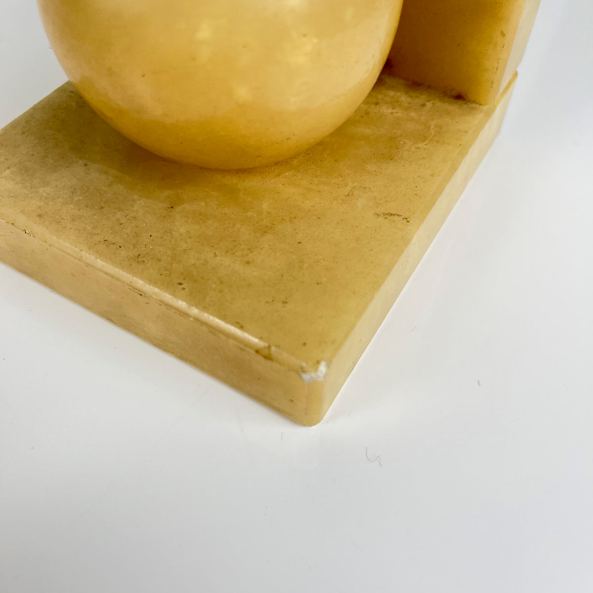 Pair of alabaster bookends, cream / yellow color 1970