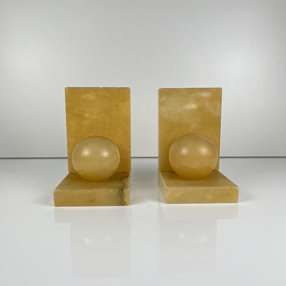 Pair of alabaster bookends, cream / yellow color 1970