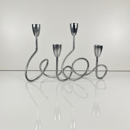 “Loop” style candle holder, 2000, chrome-plated metal