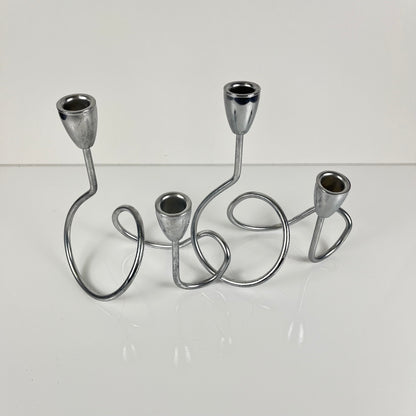 “Loop” style candle holder, 2000, chrome-plated metal