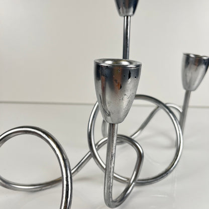 “Loop” style candle holder, 2000, chrome-plated metal