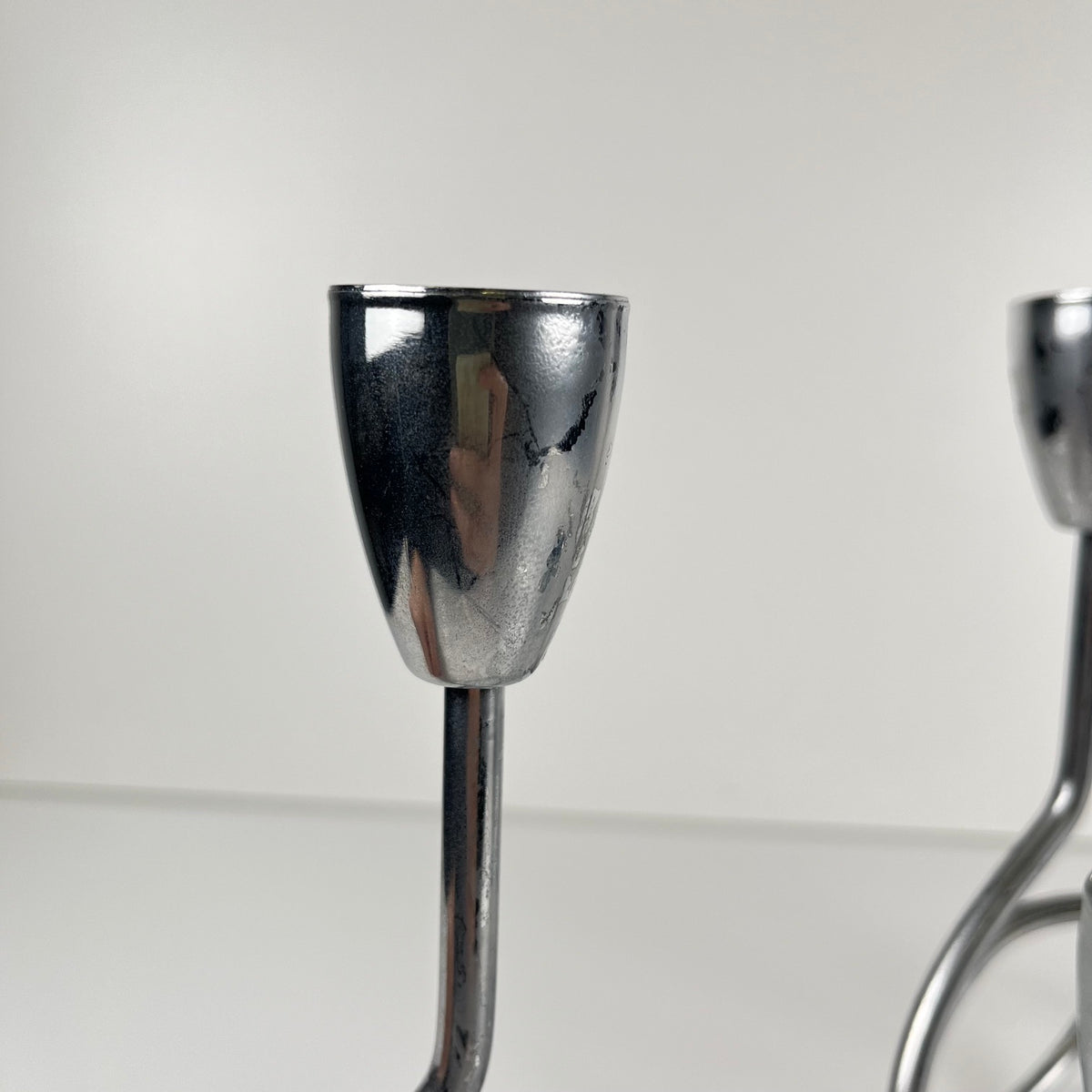 “Loop” style candle holder, 2000, chrome-plated metal