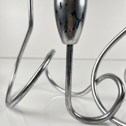 “Loop” style candle holder, 2000, chrome-plated metal