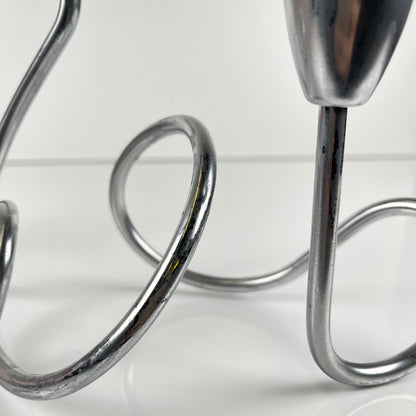 “Loop” style candle holder, 2000, chrome-plated metal