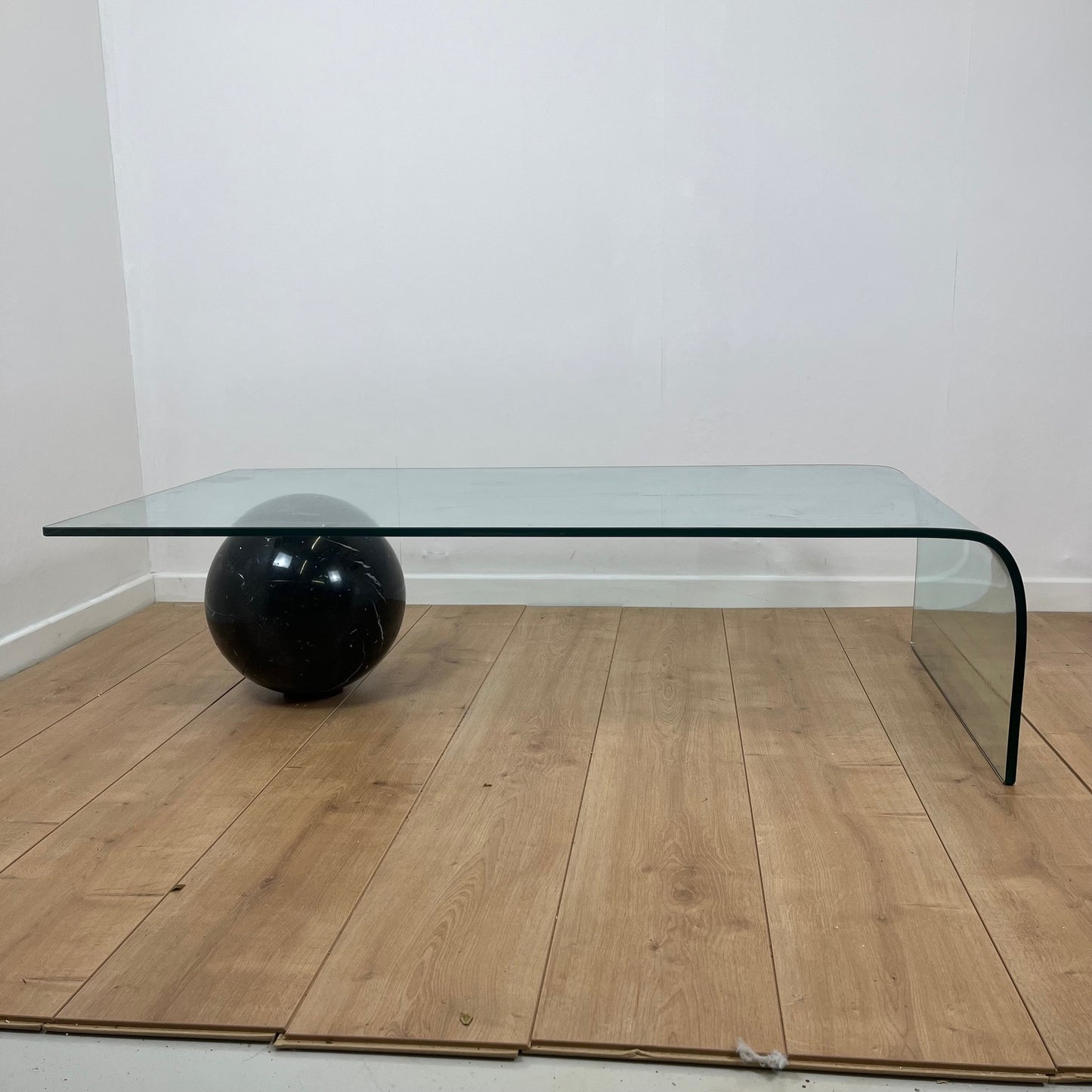 Coffee table in curved glass and black marble sphere, Giorgio Cattelan for Cattelan, 1980