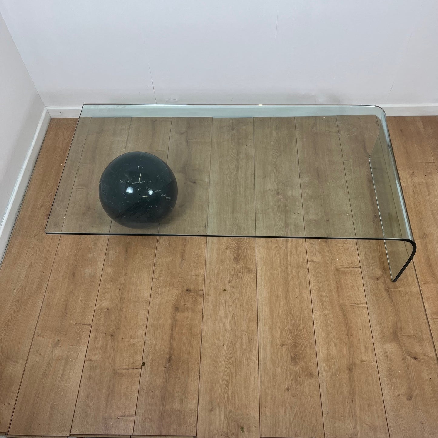 Coffee table in curved glass and black marble sphere, Giorgio Cattelan for Cattelan, 1980