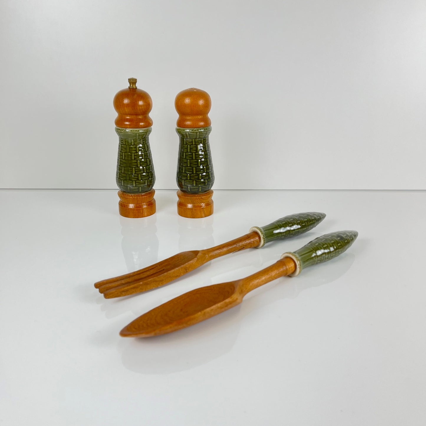Green ceramic salt and pepper shaker set and salad servers, 1970