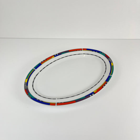 Plat Ovale en porcelaine Van well, bordure géométrique multicolore, 1980