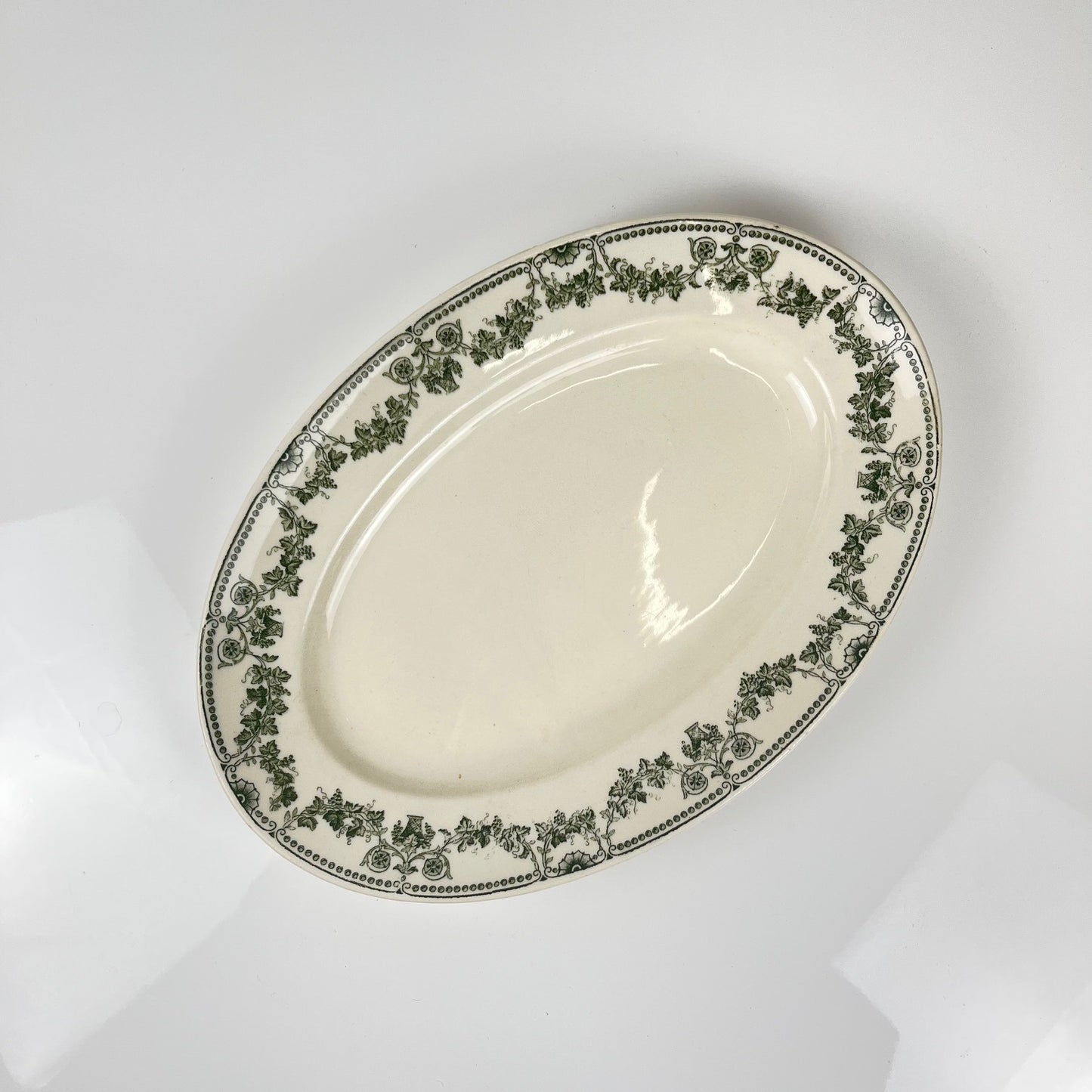 Oval dish, "Champagne" model, Badonviller, green