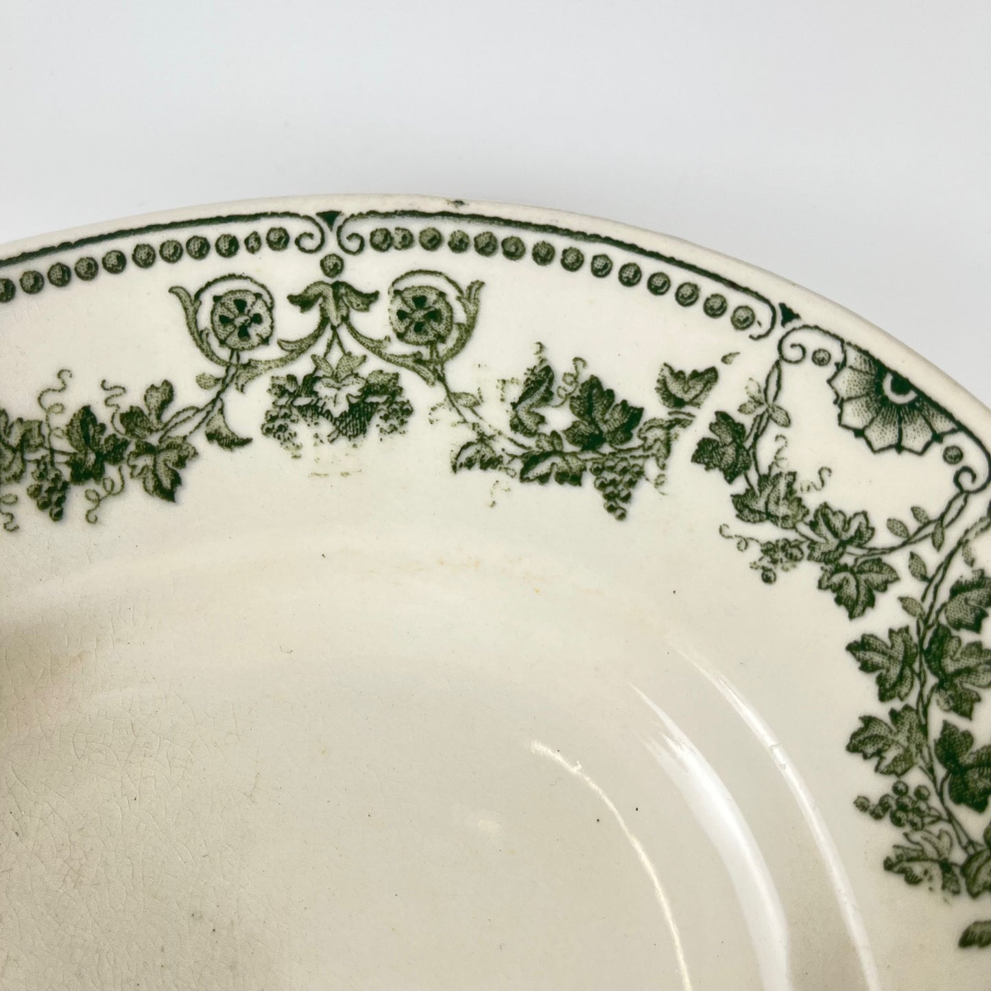 Oval dish, "Champagne" model, Badonviller, green