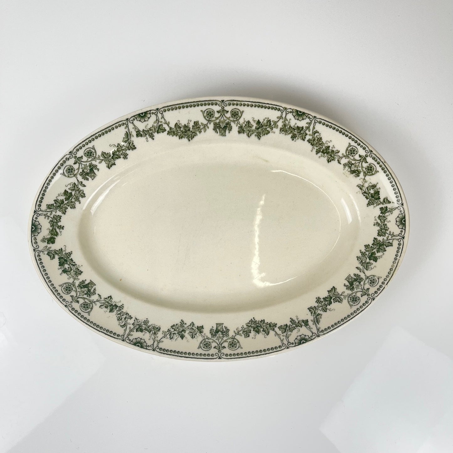 Oval dish, "Champagne" model, Badonviller, green